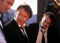 Reservoir Dogs – l-r: Mr. Blonde / Vic (Michael Madsen), Mr. White / Larry (Harvey Keitel), Mr. Pink (Steve Buscemi).
