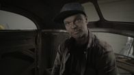Bad Chad Customs – Chad Hiltz inside 39 Studebaker catches a ray of light.