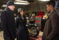 Elementary – L-R: Sherlock Holmes (Jonny Lee Miller), Dr. Joan Watson (Lucy Liu) and Detective Marcus Bell (Jon Michael Hill)