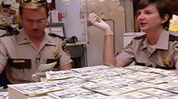 Reno 911! – L-R: Lieutenant Jim Dangle (Thomas Lennon), Deputy Trudy Wiegel (Kerri Kenney)