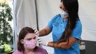 Dr. Pimple Popper – Dr. Lee examines Lattyse in the Covid tent.