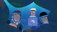Zoom - Der weiße Delfin – Yann und Auru sind mit dem berühmten Dokumentarfilmer John Shark auf Unterwasser-Expedition und schauen gerade in eine Höhle.