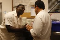 Monk – L-R: Samuel Waingaya (Adewale Akinnuoye-Agbaje ), Adrian Monk (Tony Shalhoub)