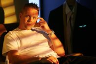 Mayday - Alarm im Cockpit – RE-CREATION: Lubitz (played by T.J. Riley) sits in his apartment and looks over at the prescribed drugs on his counter.