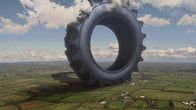 Fabriken der Superlative – CGI image - Large wheel of a tractor,