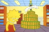 Die Simpsons – Enttäuscht steht Lisa vor ihren neuen Puppen, die sich nicht verkaufen lassen.