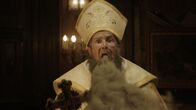 Renfield – Older Priest (William Ragsdale)