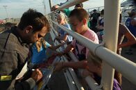 Zeb Hogans Monsterfische – Zeb signing autographs after the demolition derby (Photo Credit: NGT)