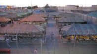 Lockdown - Hinter Gittern – Rooftop view of tent city.