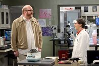 The Big Bang Theory – L-R: Bert (Brian Posehn), Amy Farrah Fowler (Mayim Bialik).