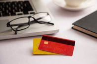 Genius – Credit cards kept on a work table.