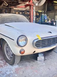 Outback Car Hunters – VOLVO before – landscape – in garage – covered in dust – front view – left hand angle.