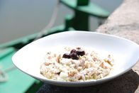 Zu Tisch ... – Das Fleisch der llisa, des Steinbeißers, ergibt zusammen mit Zwiebeln und Öl eine beliebte Vorspeise in der Albufera.
