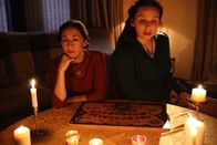 True Nightmares – Nancy Bowen (Cheyenne Quintanar) and Lila Jimerson (Mikayla Campbell) use the Ouija board.
