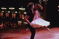 Dirty Dancing – L-R: Johnny Castle (Patrick Swayze), Baby Houseman (Jennifer Grey)