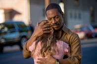 Mr. Church – L-R: Charlie (Britt Robertson) and Henry Church (Eddie Murphy)