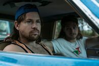 American Monster – TERRY (KAI LUKE BRUMMER) pulls up. CRAIG (ROWAN STUDTI) jumps in and they drive off.