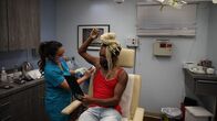 Dr. Pimple Popper – Dr. Lee marks up Tameru Logbichio during her procedure.