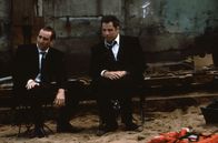 Face/Off - Im Körper des Feindes – Castor Troy (Nicolas Cage, l.); Sean Archer (John Travolta, r.)
