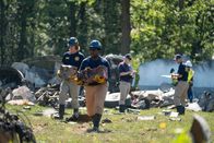 Mayday - Alarm im Cockpit – REENACTMENT - While NTSB Investigator Joe Sedor (played by Jason Faulkner) makes preliminary notes, NTSB Crash Investigators secure the Black Box, a crucial piece of evidence that will help determine what downed Comair Flight 5191. (Cineflix 2020/Darren Goldstein)