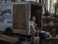 Rebuilding Paradise – Paradise, CA - Steve "Woody" Culleton sits in a small storage trailer on his property in Paradise, CA where he is rebuilding his home. (Credit: National Geographic/Pete Muller)