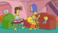 Die Simpsons – (v.l.n.r.) Shauna Chalmers; Lisa; Marge; Maggie