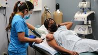 Dr. Pimple Popper – Dr. Lee operates on Stacey’s arm.