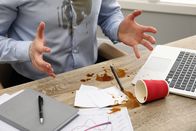 111 – Man with spilled coffee over his workplace and shirt