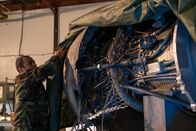 Mayday - Alarm im Cockpit – REENACTMENT - An Investigator examines an engine of a US Air Force KC-135E aircraft recovered in the desert during Operation Desert Storm. (Cineflix 2020/Darren Goldstein)