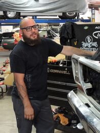 Fast N' Loud – Dustin DeLeon leans against the side of the gutted 1969 Ford F-100.