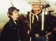 Der Teufelshauptmann – Olivia Dandridge (Joanne Dru), Capt. Nathan Cutting Brittles (John Wayne)